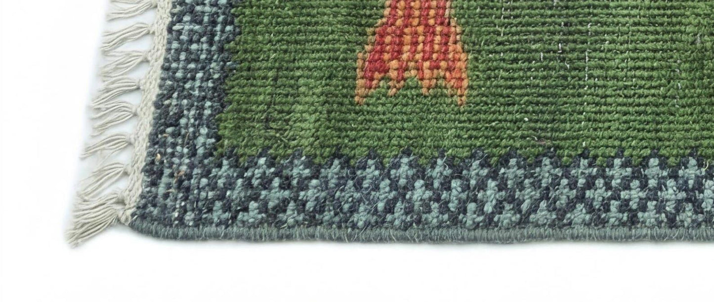 Detailed border craftsmanship on handmade Oushakaura wool fish runner rug