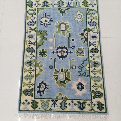 Decorative rug with floral patterns on a tiled floor