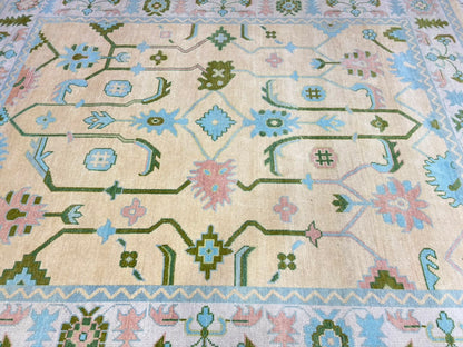 Complete floral pattern of handmade ivory blue vintage Oushak wool rug.