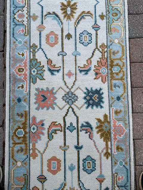 Front view of a premium handmade wool hallway runner with traditional Oushak-inspired motifs.