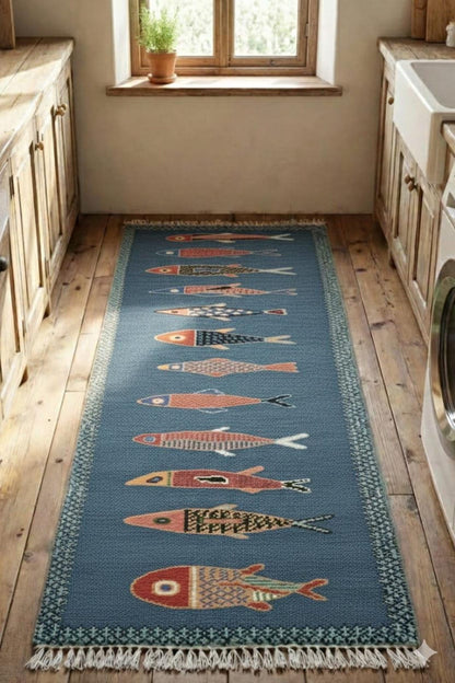 Blue coastal fish runner rug styled in farmhouse kitchen