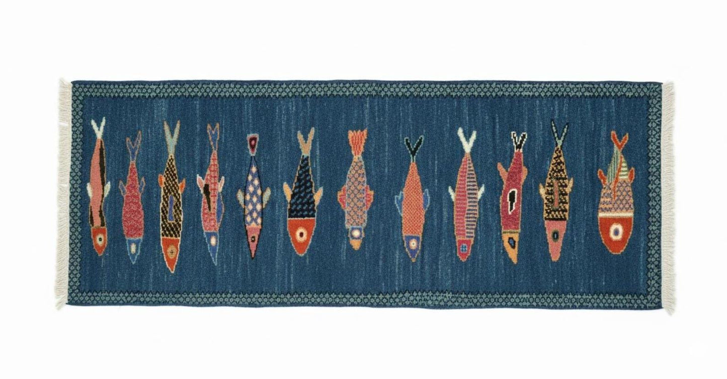 Vertical flat lay view of handmade nautical fish runner rug
