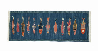 Vertical flat lay view of handmade nautical fish runner rug