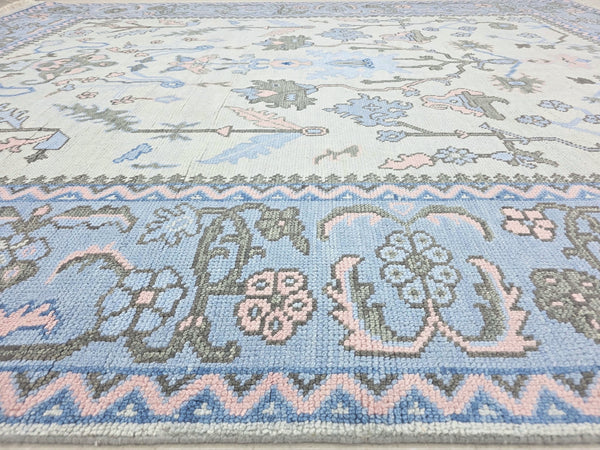 Blue traditional runnernshowing woven texture, floral pattern and folded corner
