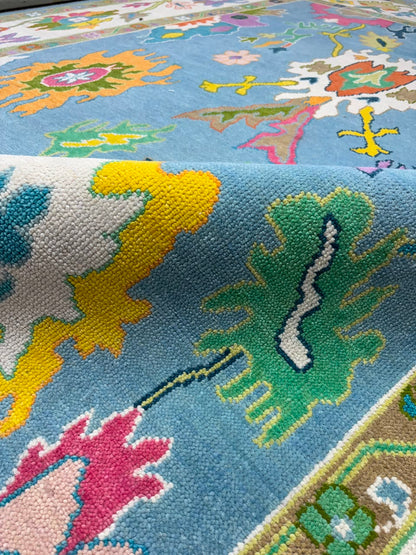 Close-up of artistic botanical motifs on handmade contemporary rug