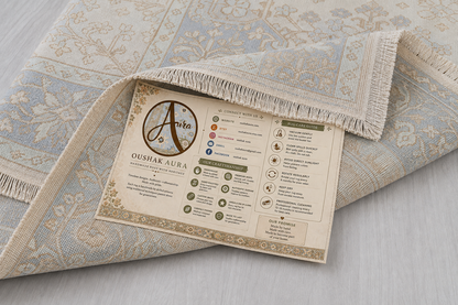 Cream and blue handmade rug with fringed edge and Oushakaura care guide