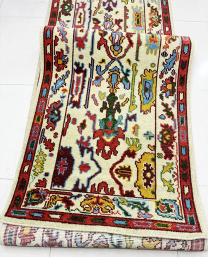 Handmade Oushak runner rug in cream and red vintage Turkish design for hallways and entryways
