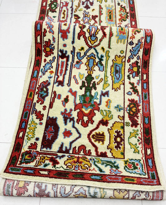 Handmade Oushak runner rug in cream and red vintage Turkish design for hallways and entryways