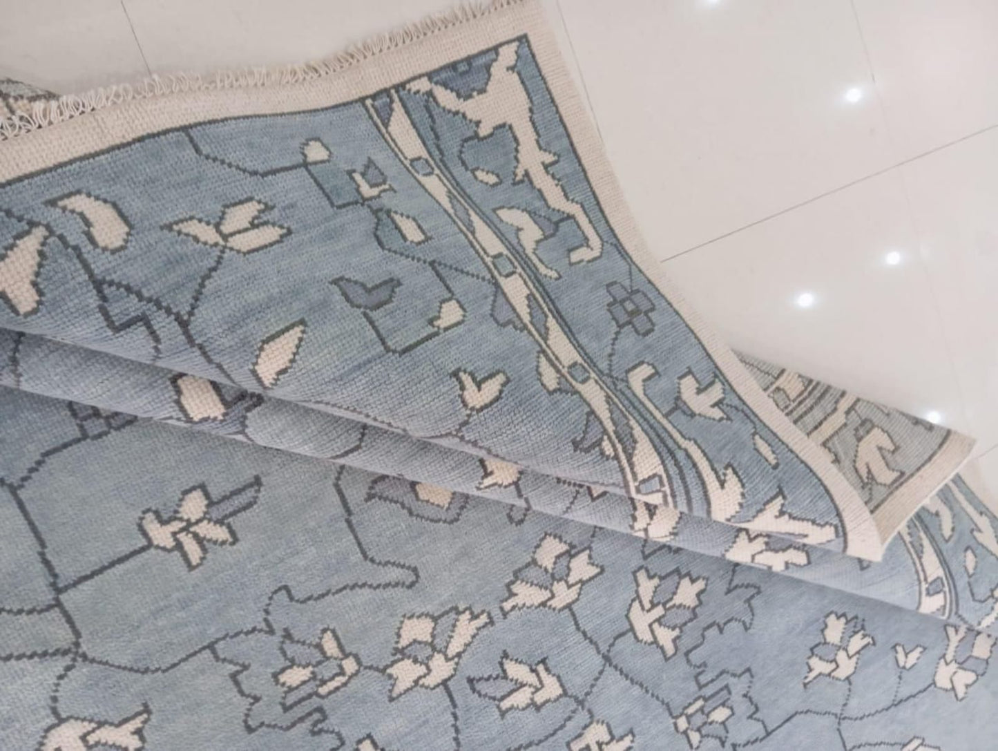 Flatweave wool rug corner showing craftsmanship and weave quality