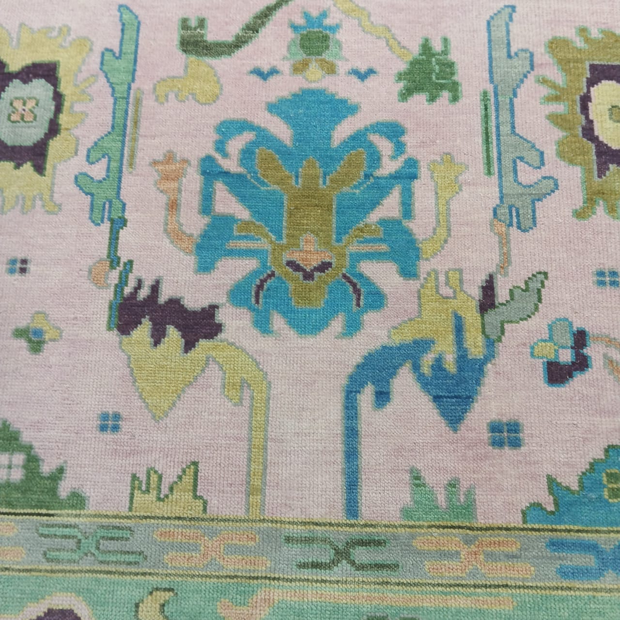 Hand knotted wool rug edge and fine craftsmanship detail