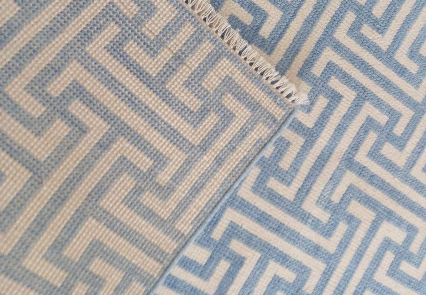 Close-up of handmade wool rug edge and flatweave texture