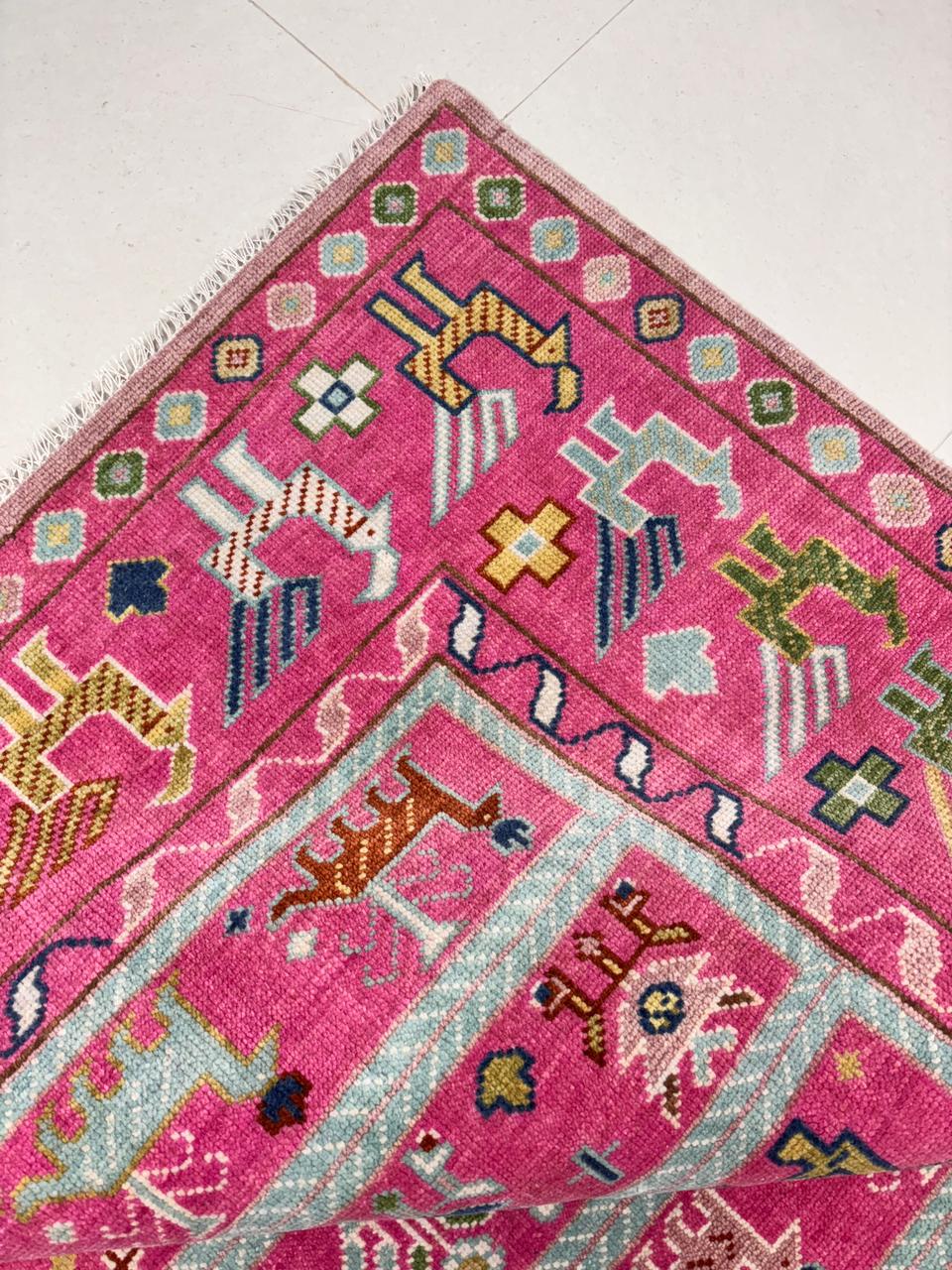 Handwoven Oushak rug fringe and edge detail with natural wool finish