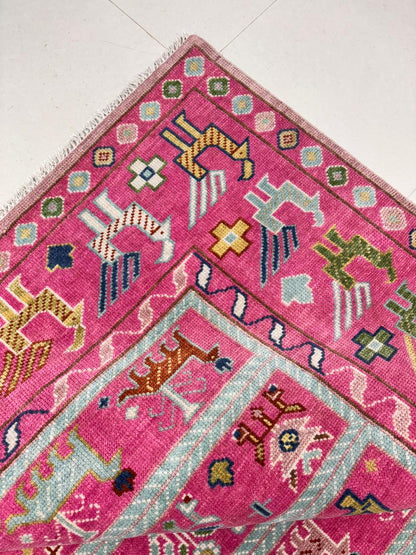 Handwoven Oushak rug fringe and edge detail with natural wool finish