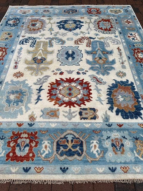Handmade Oushak Rug in Ivory and Sky Blue with Traditional Floral Medallion Design | Oushakaura
