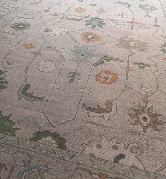 Full view of modern Oushak handwoven wool rug in sage green and blue tones