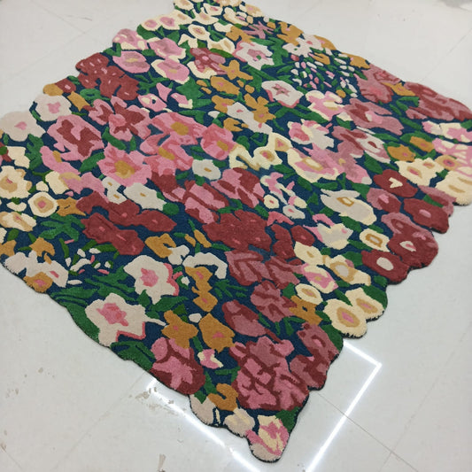 Multicolor floral tufted area rug with pink burgundy green and navy flowers