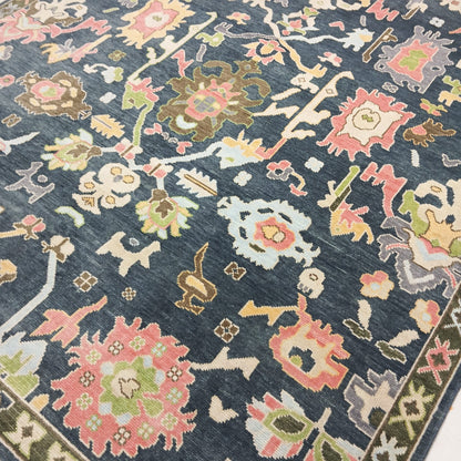 Corner detail showing craftsmanship of handmade Oushak rug