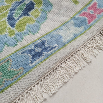 Oushak rug border and fringe detail handmade in India