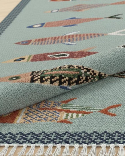 oushakaura Close-up of a rug with fish patterns 