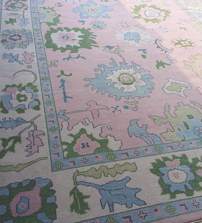 Pink Oushak Rug with Blue & Green Floral Design
