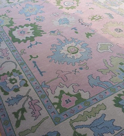 Pink Oushak Rug with Blue & Green Floral Design