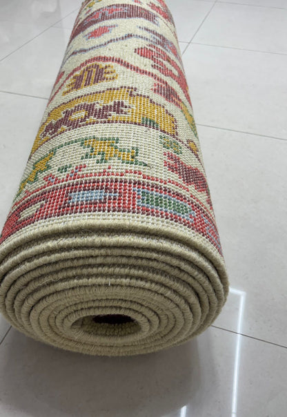 Rolled handmade Oushak runner rug ready for shipping