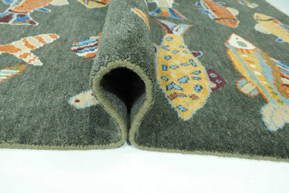 Folded fish pattern wool rug showing texture and thickness detail