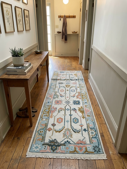 Vintage handmade Oushak hallway runner rug with ivory and sky blue tones styled in a modern home hallway, crafted from premium wool.