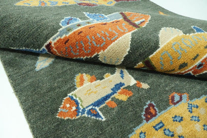 Decorative rug with fish pattern on a green background